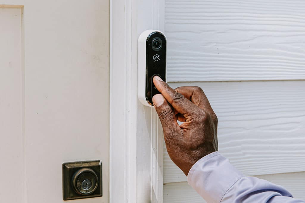 man_testing_doorbell